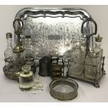 2 silver plated and cut glass cruet sets in stands.