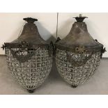 A pair of heavily beaded acorn shaped chandelier style lamp shades with floral swag detail.