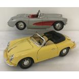 2 unboxed diecast Burago cars, 1:18 scale.