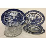 3 blue and white willow pattern meat plates and a serving bowl.