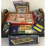 A collection of vintage games and packs of playing cards.