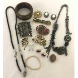 A small quantity of costume jewellery to include clip on earrings and bracelets.