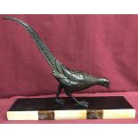 An Art Deco bronze figurine of a pheasant, on a marble clad plinth.