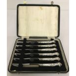 A boxed set of 6 silver-handled fruit knives