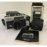 A vintage Ricoh 500G camera complete with instruction booklet and case.