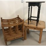 A large vintage wooden magazine rack with drawer.