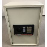 A boxed electronic metal safe by Kingavon.