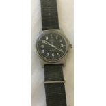 CWC military issue quartz wristwatch, 1984, on original canvas strap, in working order.