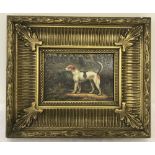 A gilt framed oil on board of a dog in woodland scene.