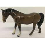 A Beswick ceramic Pony figurine (Boy's Pony) #1480, in brown colourway.
