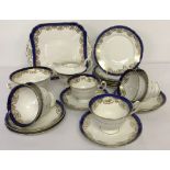 A collection of blue and gold Shelley Tea ware.