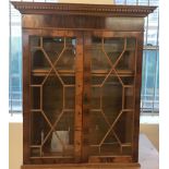 A modern veneered wooden display unit/bookcase.