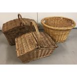 Three large wicker baskets.