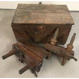 A small vintage pine tool box containing 2 vintage wood working planes.
