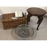 A wicker picnic basket.