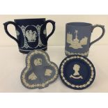 4 pieces of navy and pale blue Wedgwood Jasperware ceramics.
