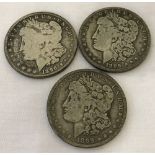 3 Morgan silver dollar coins, 2 dated 1896, 1 dated 1899. All with New Orleans mint mark.