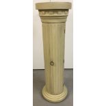 A fibreglass pedestal column in classical style.