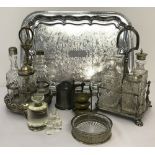 2 silver plated and cut glass cruet sets in stands.