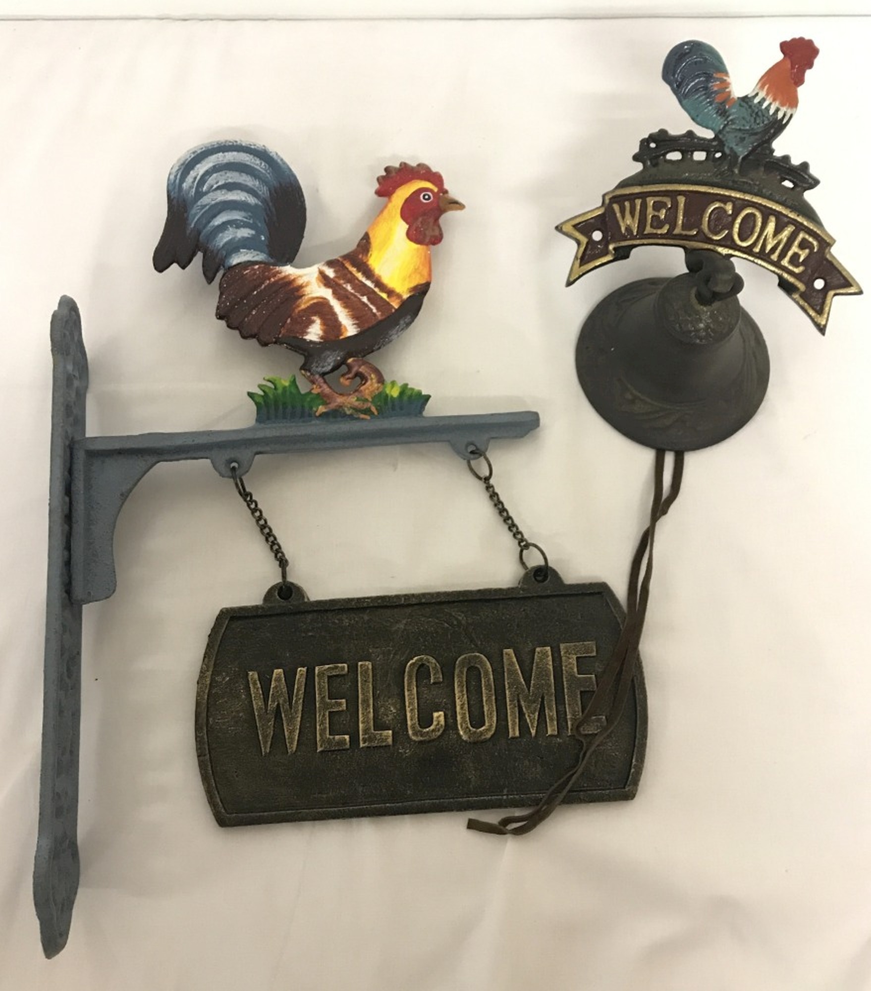 2 painted cast iron wall hanging "Welcome" signs with cockerel detail.