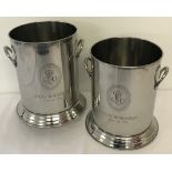 A pair of 2 handled Louis Roederer champagne coolers with engraved detail to front.