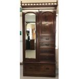 A large Victorian mahogany mirrored door tallboy wardrobe with turned final top plinth.