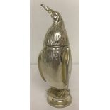 A heavy silver plated novelty penguin shaped sugar sifter.