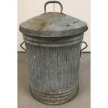 A vintage galvanised 2 handled lidded dustbin.