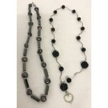 A hematite and grey freshwater pearl necklace with 925 clasps by The Genuine Gem Company.