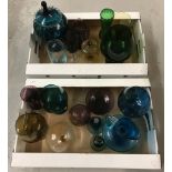 A large collection of vintage coloured glass items.