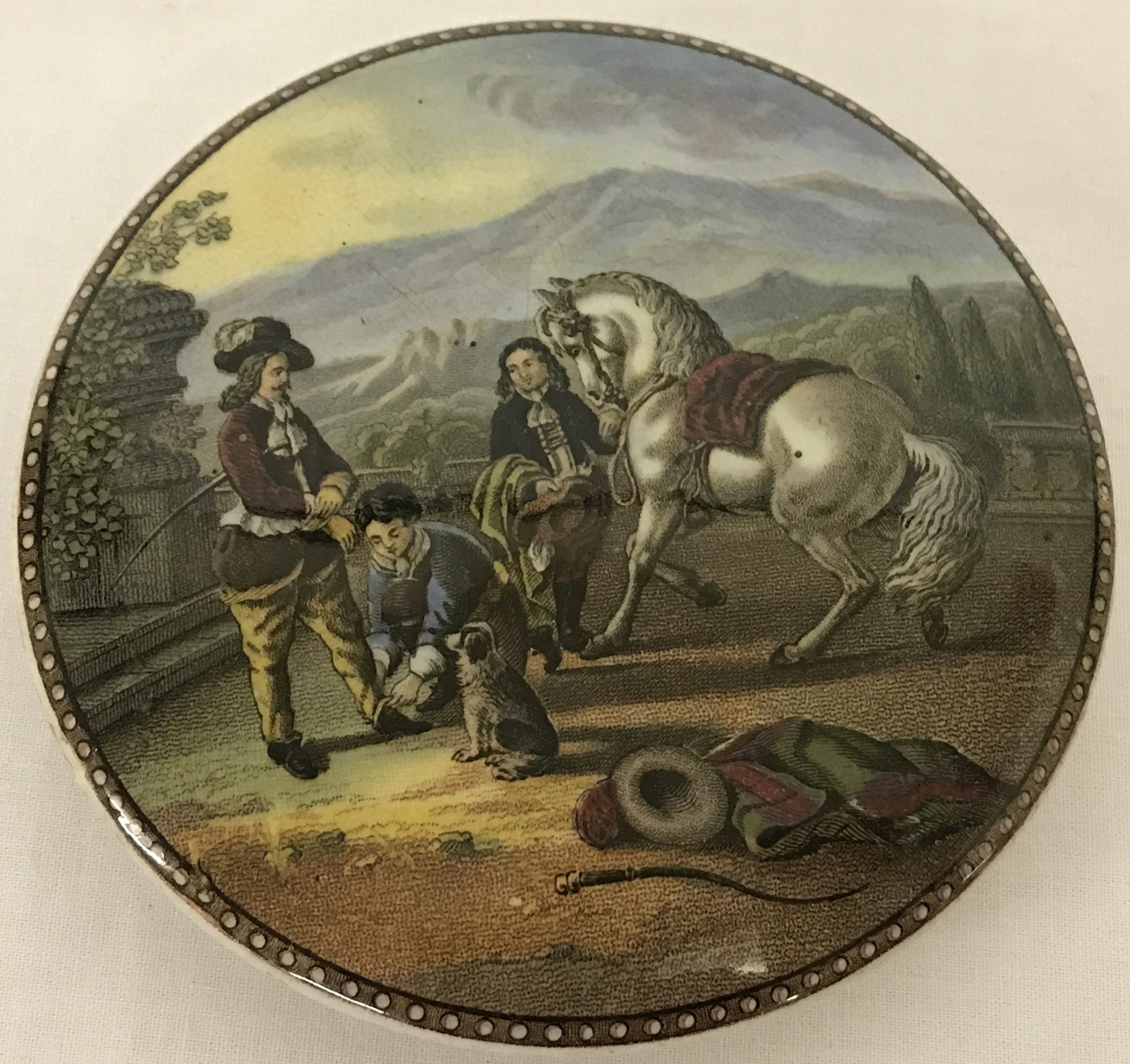 A Victorian Prattware pot lid "Preparing for the Ride".