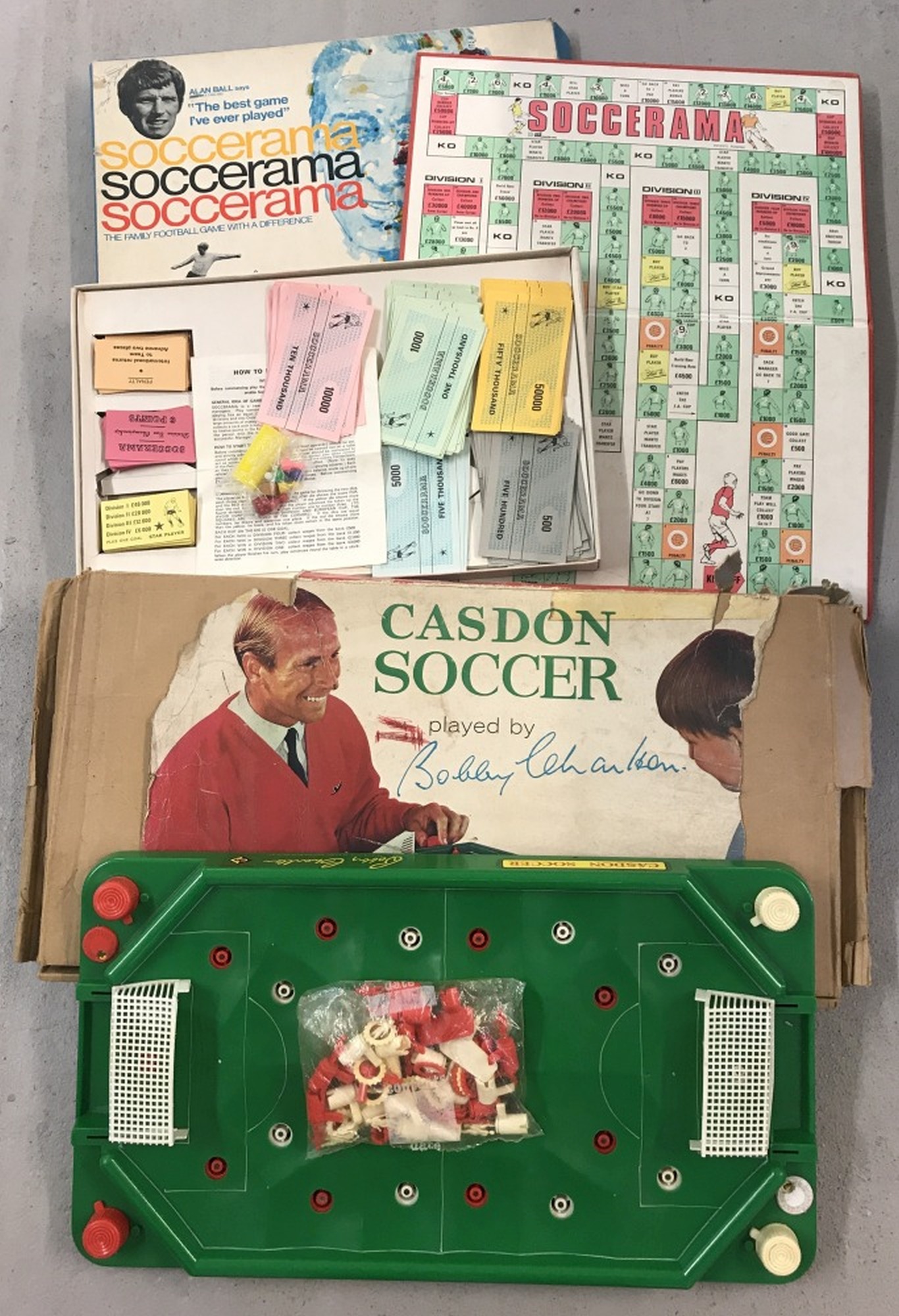 A vintage boxed Casdon Soccer Bobby Charlton game.
