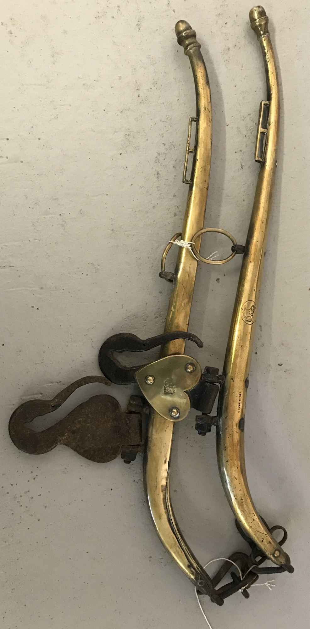 A pair of vintage brass hames.