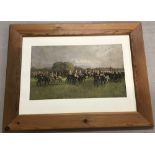 A pine framed colour military print entitled "Trooping the Colour".