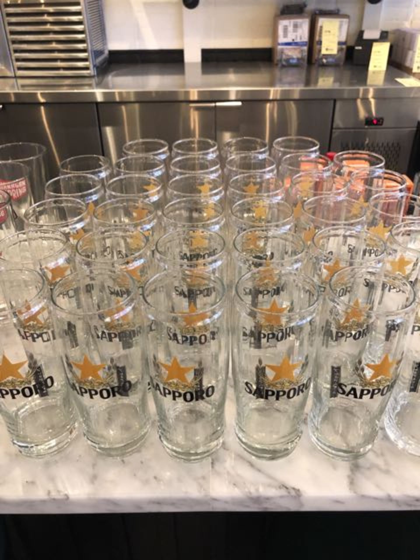 Lot de (34) verres a bieres SAPPORO