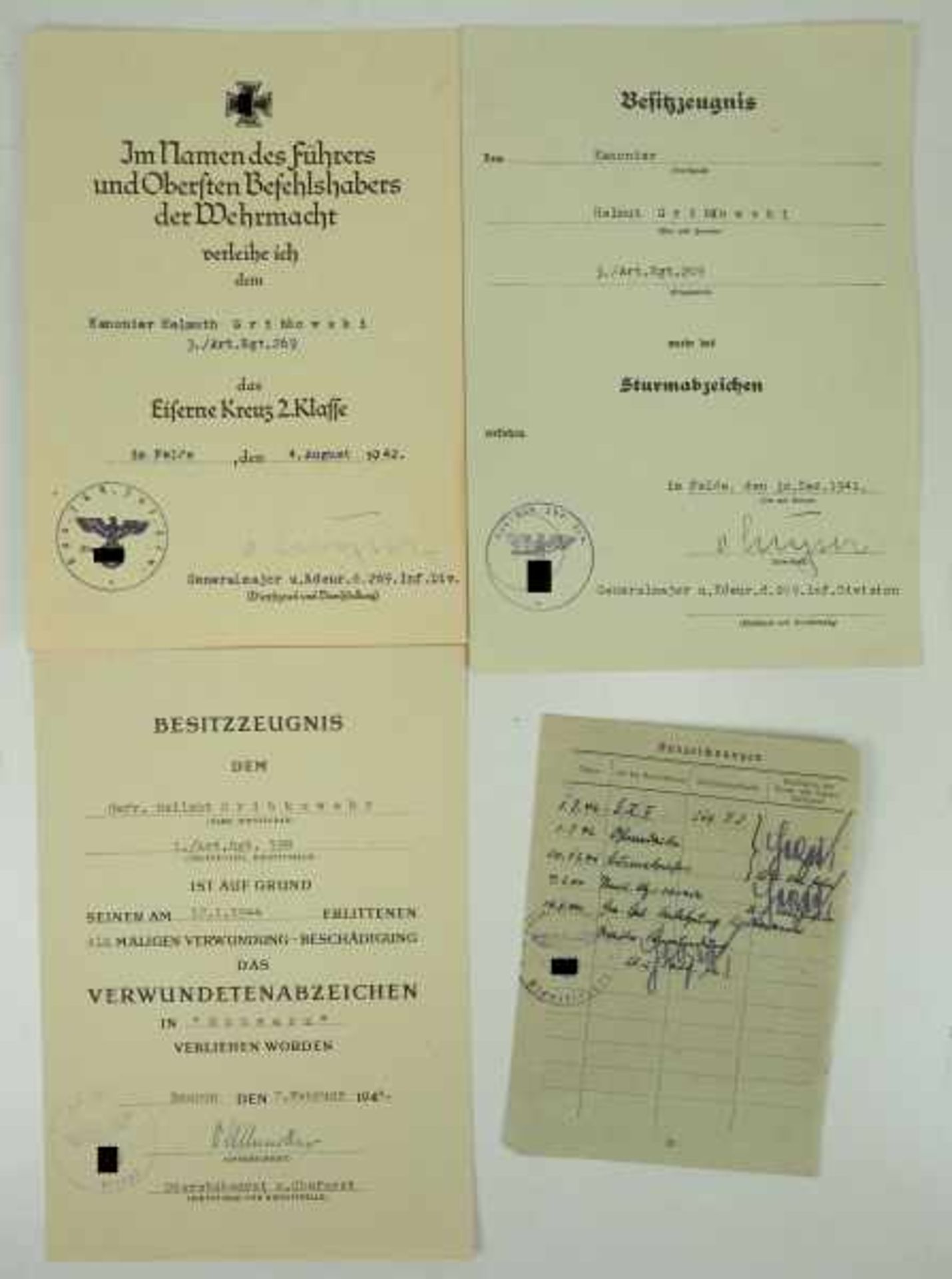 3.1.) Urkunden / DokumenteUrkundengruppe eines Gefreiten der 3./ Artillerie-Regiment 269 / 198.-