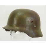 4.1.) Uniformen / KopfbedeckungenUngarn: Stahlhelm M35.Olivgrün lackierte Glocke, am Rand auf der