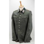 4.1.) Uniformen / KopfbedeckungenWehrmacht: Feldbluse eines Leutnant der Infanterie.Feldgraues Tuch,