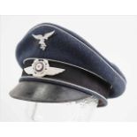 Luftwaffe: Schirmmütze für Mannschaften.Luftwaffentuch, schwarzer Bund, silberne Vorstöße,