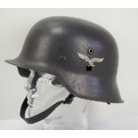 Luftwaffe: Stahlhelm M42.Glocke mit Originallackierung, der Adler zu ca. 75% erhalten, gestempelt