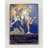 Abzeichen der 1. Leichtathletik-Europa-Meisterschaften 1938 in Wien.Buntmetall versilbert, teilweise
