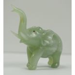 China: Jade Elefant.Grüne, leicht transluszide Jade, Elefant mit empor gerecktem Rüssel.Höhe ca.