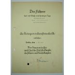Kriegsverdienstmedaillen Urkunde für einen Ortsgruppenleiter in Berlin-WaidmannslustVordruck,