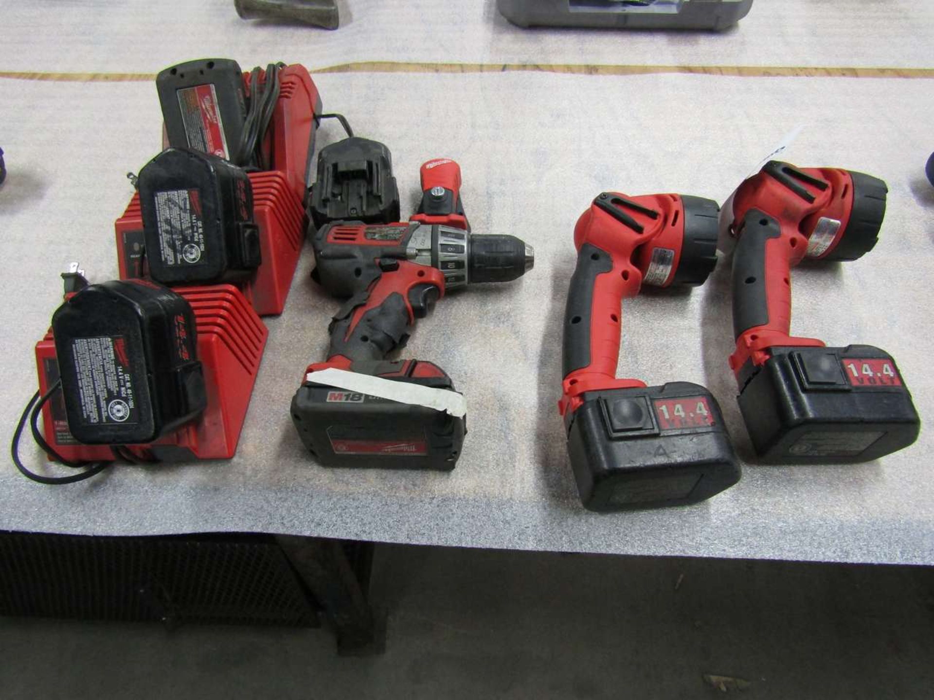 Milwaukee 2 Flashlights 1 Drill and 2 Chargers