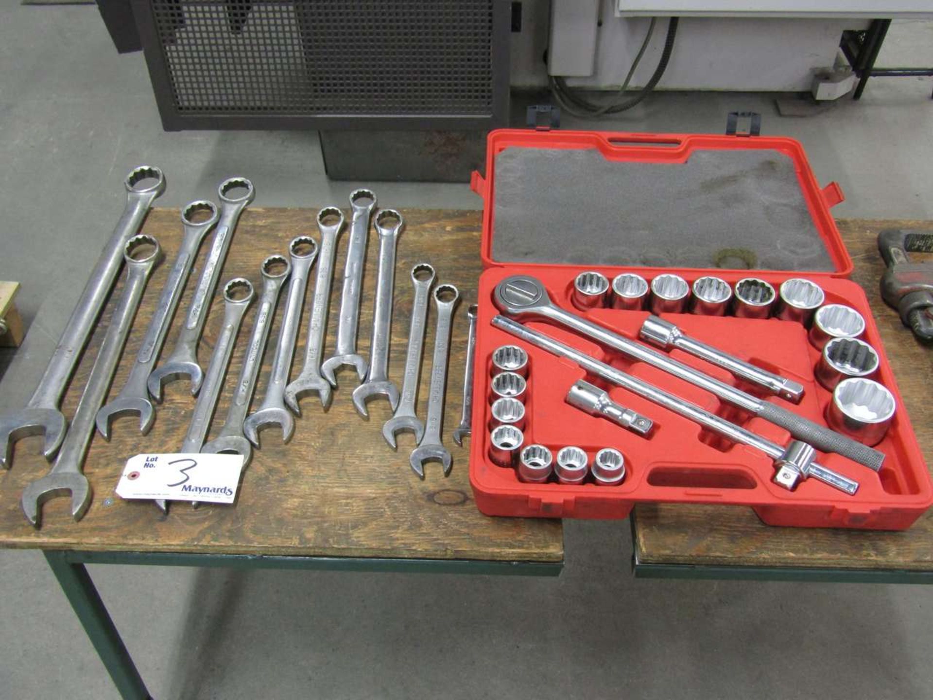 1 Large Ratchet set in carrying case and several Large wrenches