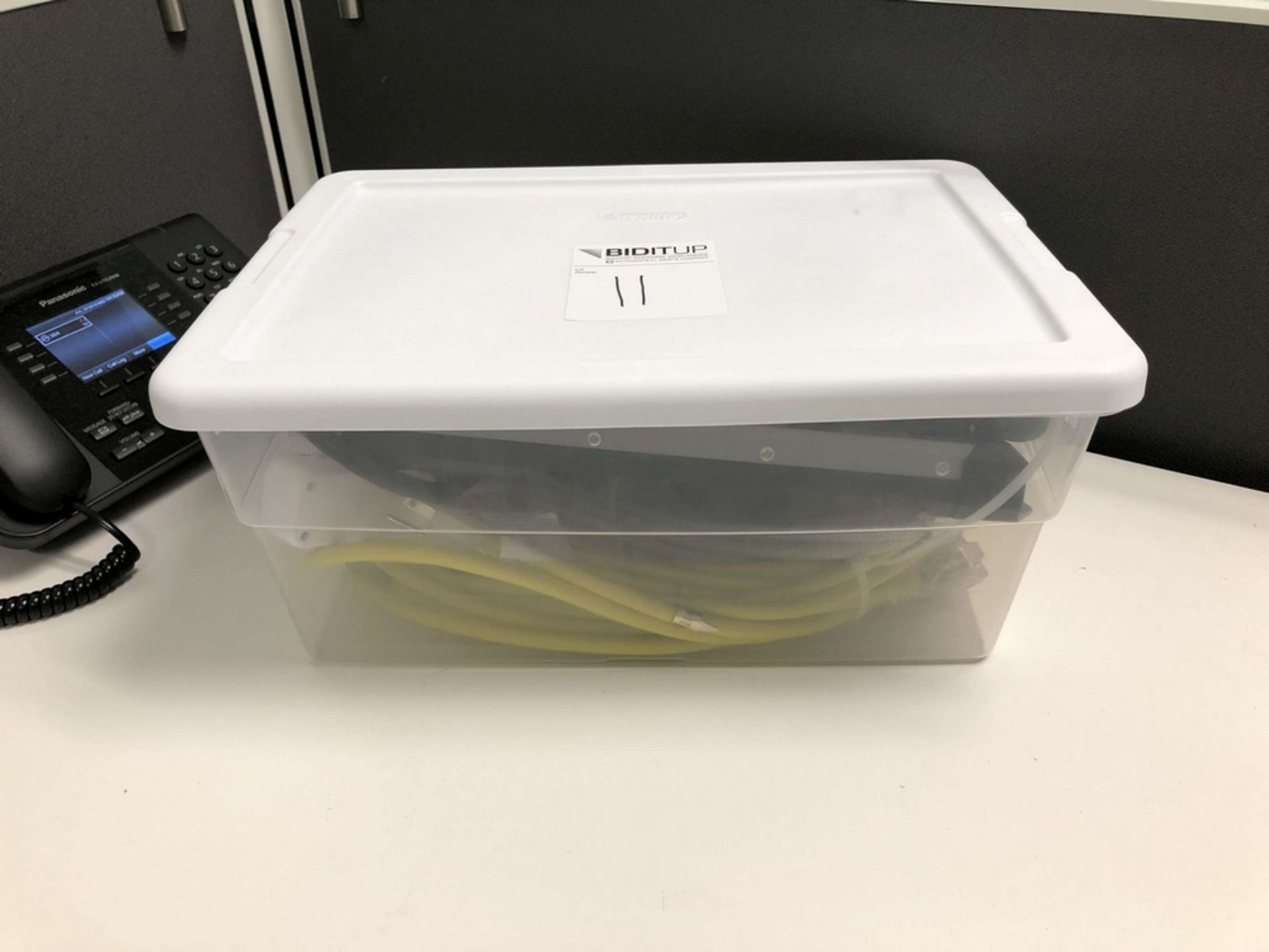 Plastic Bin w/ (3) Power Strips & (2) Extension Cords