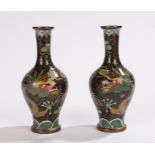 Pair of Chinese cloisonne miniature vases, with black grounds and swirling dragons, 11cm high, (2)