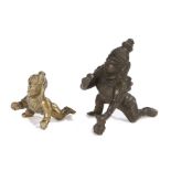 Two 20th Century Indian figures of the God Krishna as a crawling baby with a ball of butter, one