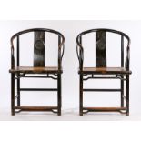 Pair of Hangzhou horseshoe armchairs, with arched backs and carved medallion above a woven seat