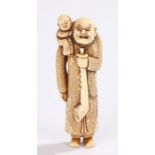 Japanese Edo period ivory netsuke, Shoki and child, with a long pipe, 9cm high